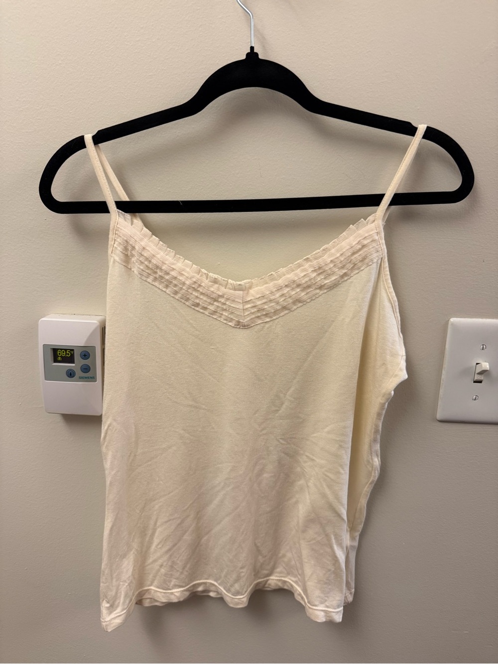 white cami with ruffle detail on top
